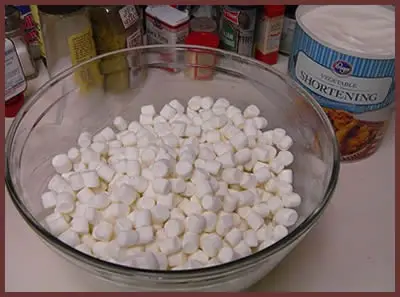 Place Marshmallows In A Greased Microwave Safe Bowl